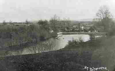 This old picture shows the view across the mill dam. The Wheelhouse is on the right.